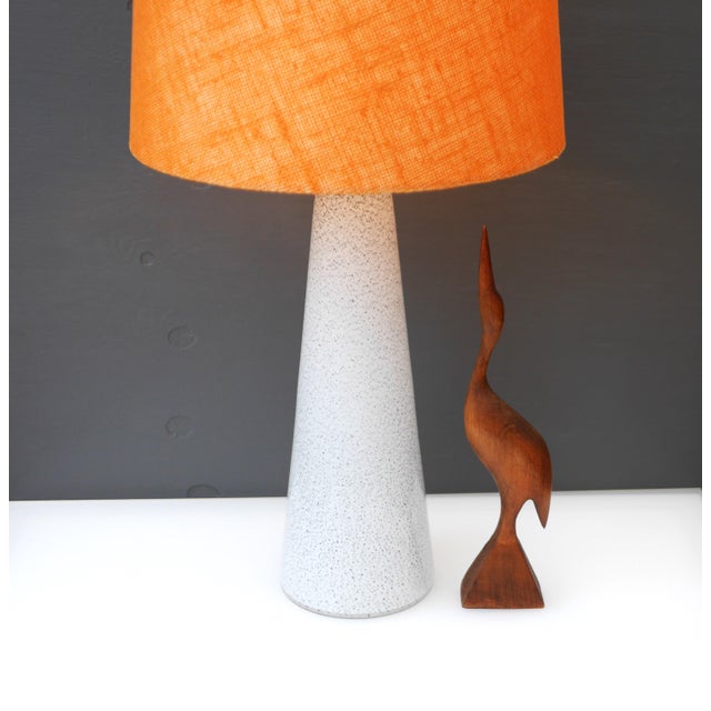 This is a beautiful, elegant, rather tall and slender hand-blown vintage glass lamp base, handmade by the talented bengt...