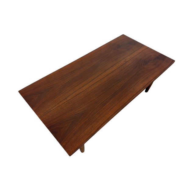 This striking 1960’s Mid-Century Modern walnut coffee table showcases the timeless simplicity and craftsmanship that...
