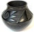 Signed Santa Clara Pueblo Carved Blackware Pottery Vase, Juanita Pueblo, Mid-20th Century This sculptural blackware...