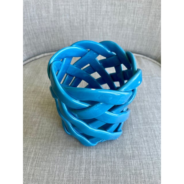 Exquisite handmade Primo' Gi ceramic woven basket in a stunning blue hue, crafted with care in Italy.
