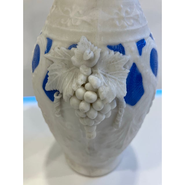 This pair of Parian vases date from the 1870’s The grape accents are designs favored in The Renaissance Revival period The...