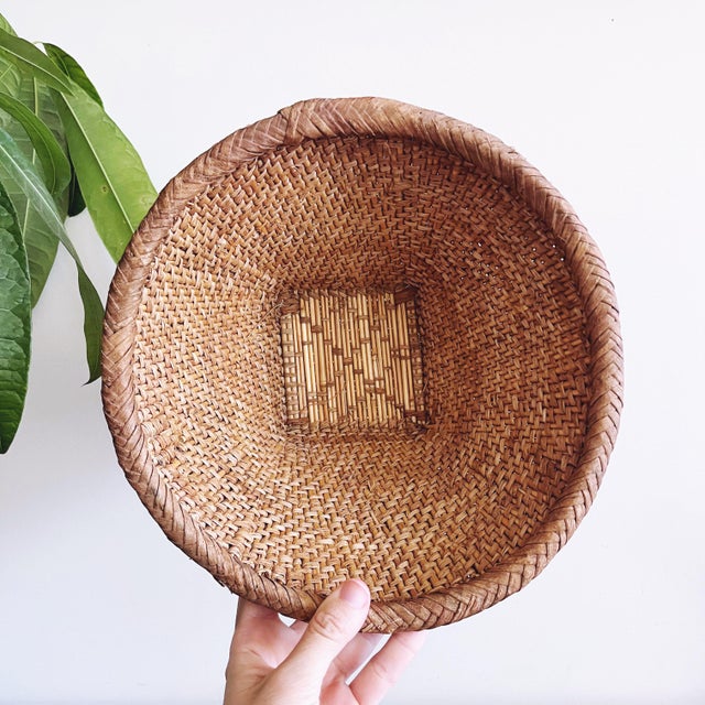Beautiful vintage woven grass baskets — handmade by the Mossi people of Burkina Faso. The basket is in beautiful vintage...