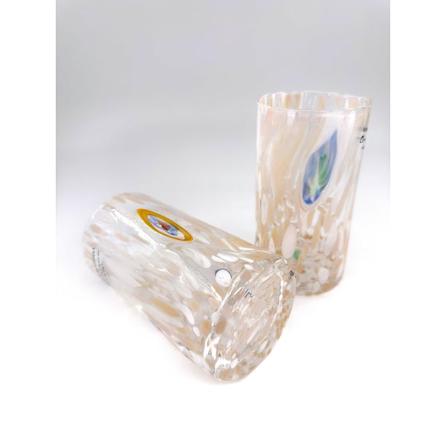 A beautifully set of four hand-blown art glass tumblers attributed to Alessandro Coppola, created by the skilled glass...