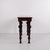 Wall table also used as a console table made in mahogany from around the 1880s. The table features round carved legs and...