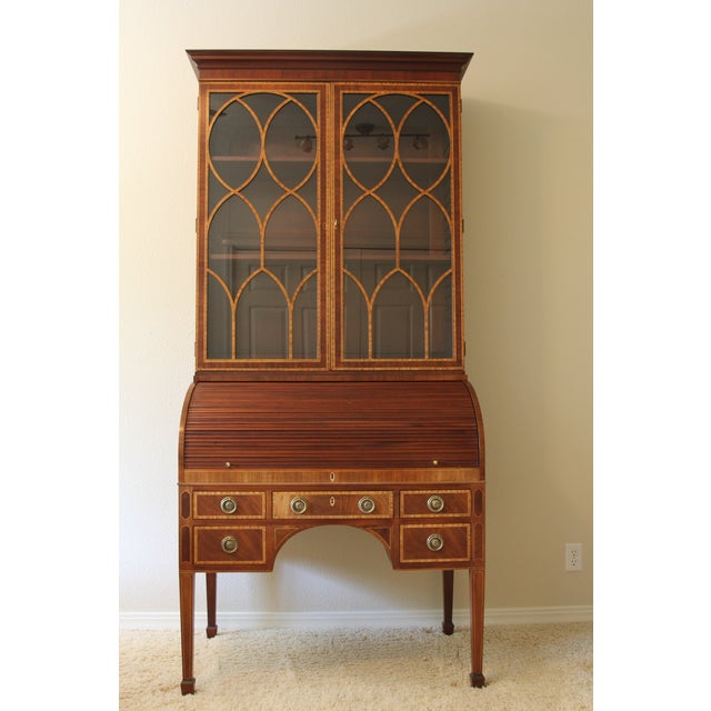 A two-part tambour secretary from the Mount Vernon Collection by Hickory Chair, made under license from the Mount Vernon...