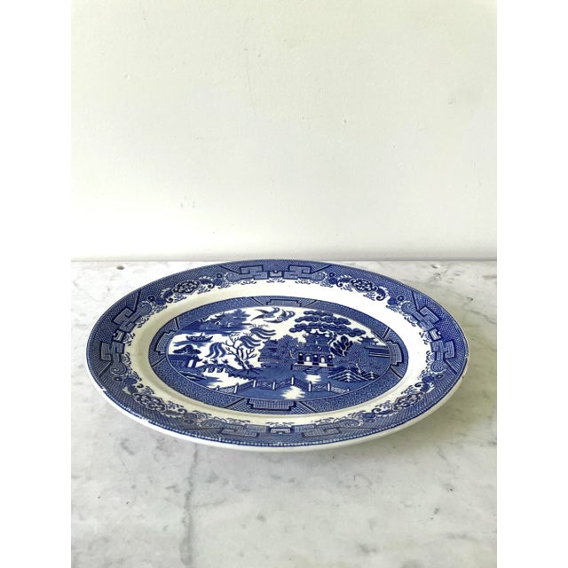 Lovely early 20th century blue Willow platter. Good condition no chips. A wonderful addition to any blue Willow collection.