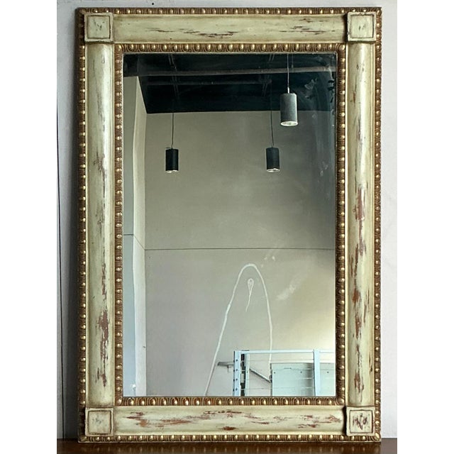 Command attention with the timeless elegance of this oversized Regency-style mirror. A stunning example of Neoclassical...