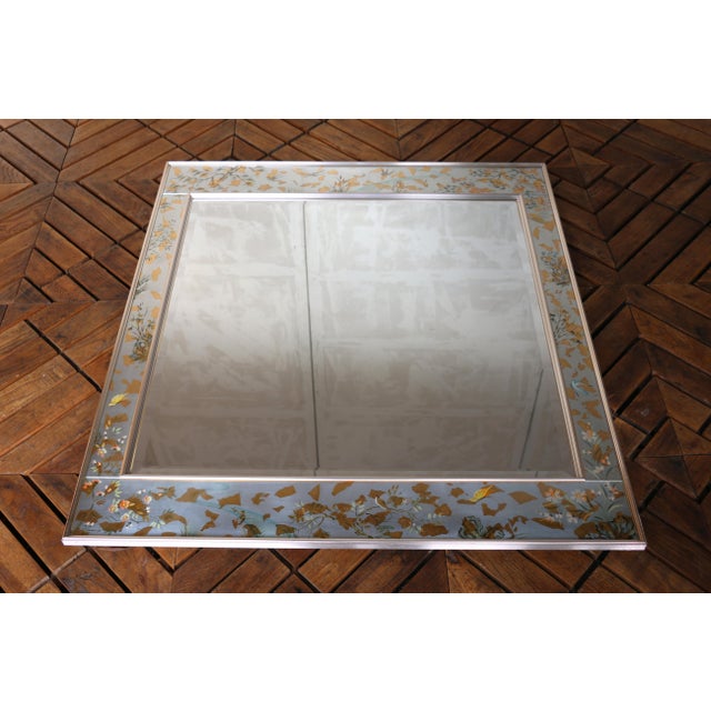 Beautiful vintage LaBarge mirror featuring a silver-leaf frame with intricate reverse hand-painted chinoiserie decoration,...