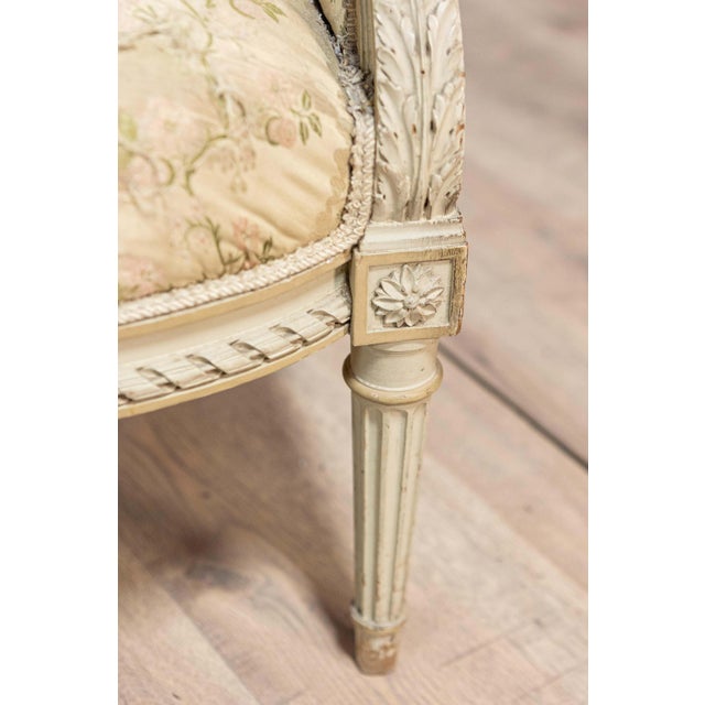 Off-white Pair of French Louis XVI Style 1900s Painted and Carved Bergères à Oreilles For Sale - Image 8 of 12