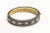A lovely bangle bracelet with alternating rosecut diamonds and oval, faceted blue sapphires all bordered on both sides...