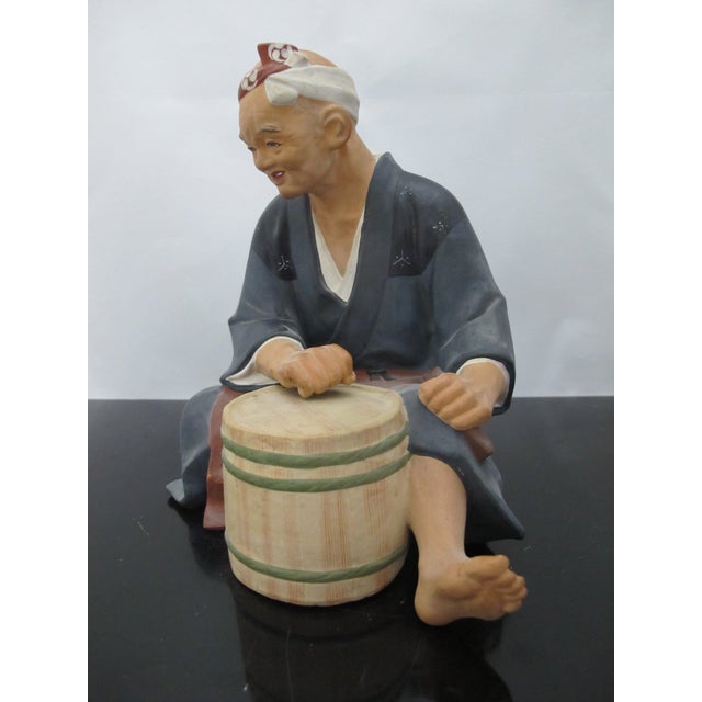 Vintage Japanese Hakata Urasaki clay doll figurine of elder man seated playing drum. Collectible Japanese statue dating...