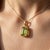 Peridot Emerald-Cut Pendant Necklace – August Birthstone This elegant necklace features a vibrant peridot gemstone,...