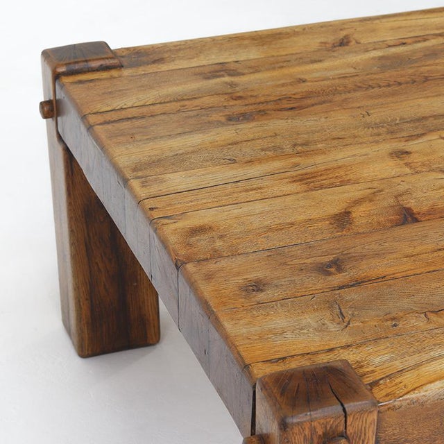 A sturdy, brutalist coffee table, crafted from thick solid oak and assembled using traditional mortise-and-tenon joints....