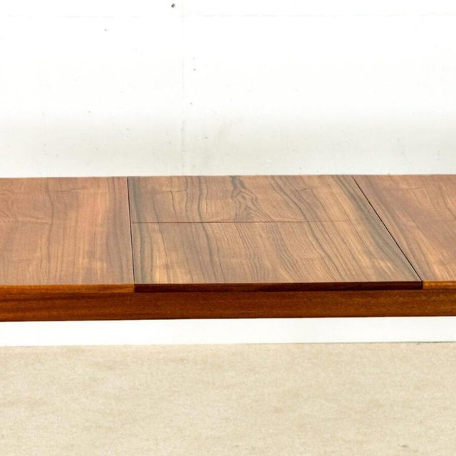 An exquisite creation by Scottish designer Tom Robertson , this dining table was handcrafted in the 1960s by A.H. McIntosh...