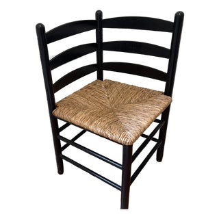Vintage Mid-Century Ebonized Ladder-Back Corner Chair With Woven Rush Seat For Sale