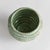 With a reactive glaze and hand finished ribbing detail, this charming sage green pot is a great find. Plant your favorite...