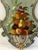 Dating from the 50’s this hand painted wooden panel has pomegranates, cherries, peaches, plums,oranges & grapes Stamped...
