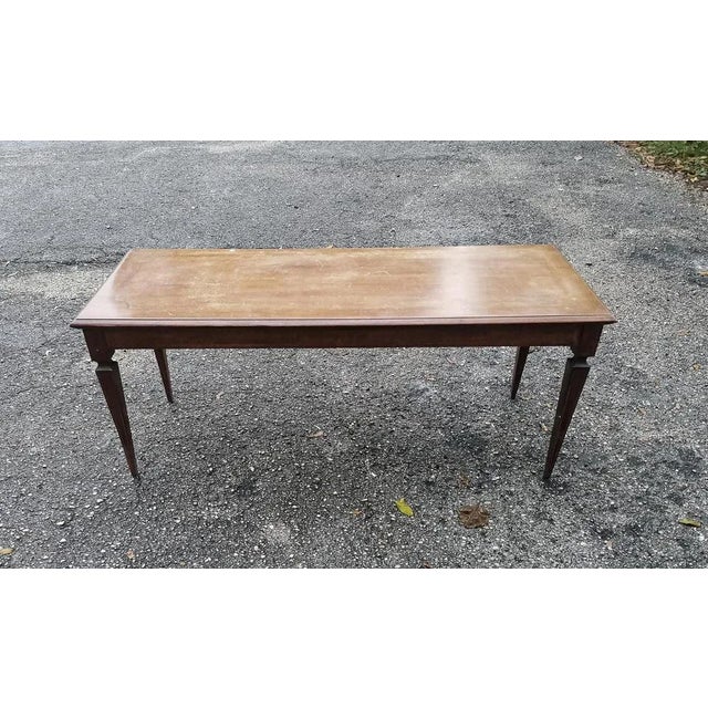 Rectangular inlaid low coffee table 1950s with highly decorated top and pinned stems. Measurements 121 x47 x h 50 category...