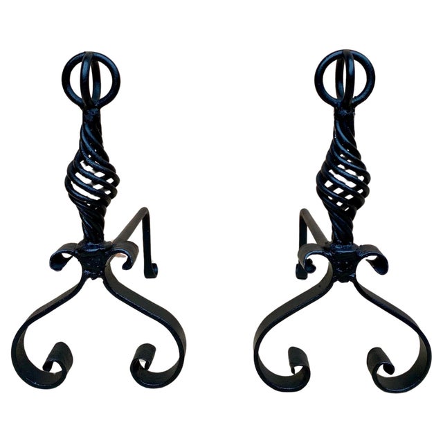 Rare pair of small wrought iron fire dog andirons with decorative brass finials.