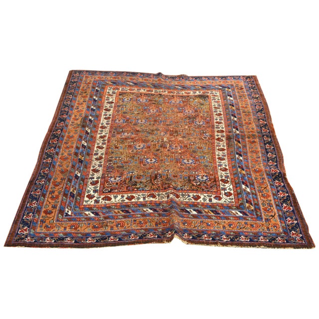 Hand-knotted with care using traditional rug making techniques, this wool rug blends timeless craftsmanship with a modern...