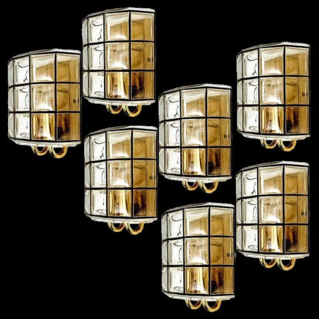 One of the seven beautiful and unique hand blown glass wall lights. Manufactured by glashütte limburg in germany during...