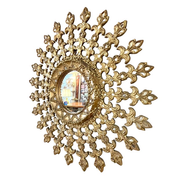 Stunning large size carved gilt wood mirror with original tag from Lima, Peru. The mirror is in a traditional sunburst...