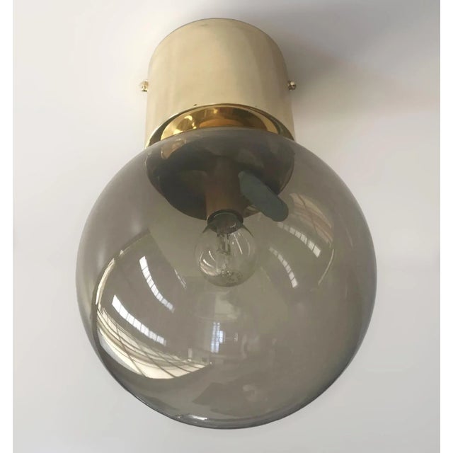 Italian flush mount with smoky Murano glass globe and solid brass frame in lacquered polished brass finish / Made in Italy...