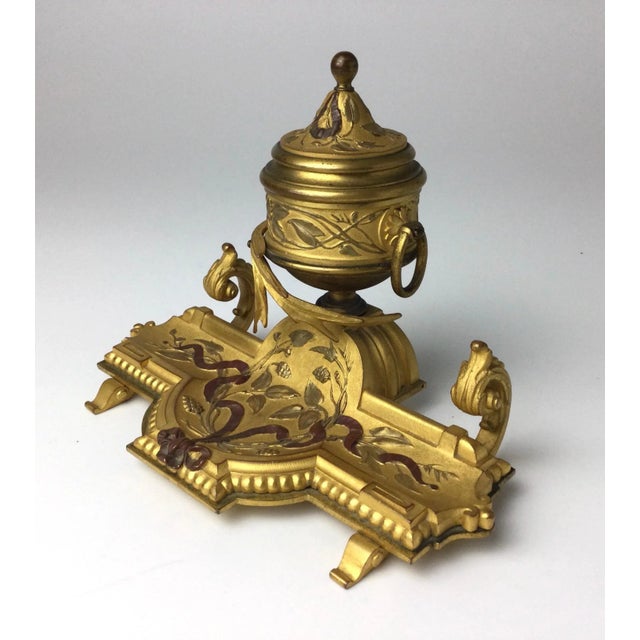 Beautiful mid-19th century gilt bronze French inkwell. Measures: 6 1/2' wide by 4" deep by 4 3/4" tall.