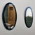 A striking pair of Italian blue oval mirrors, attributed to Cristal Arte, dating from the 1970s. Each mirror features a...