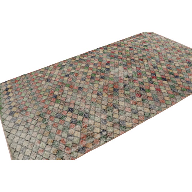 This vintage 5x10 rug, hand-knotted in wool, circa 1960-1970, is a new addition to Rug & Kilim Collection. This line is a...