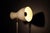 Floor lamp in white lacquered metal and brass, switzerland, 1950s. Electrification checked. Some signs of wear on the base...