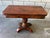 Exceptional 19th-century American Empire folding game table, circa 1840–1860, crafted in richly figured mahogany. The...