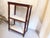 This Louis XVI style end table with marble top and shelves, has reeded tapered legs and bronze sabots. The height between...