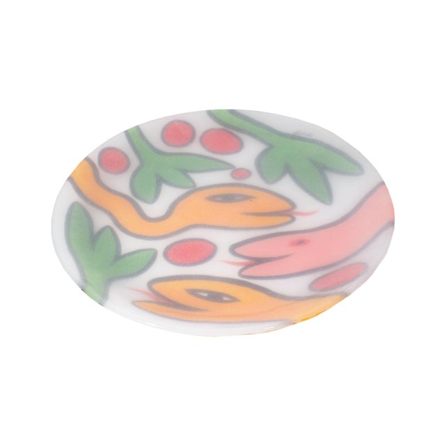 A glass plate designed by Swedish artist Ulrica Hydman (1938-2018) for Swedish glass company Kosta Boda. This plate has a...