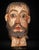 Expressive carved and polychromed wooden head of a male saint, produced in Colonial Mexico during the late 16th or early...