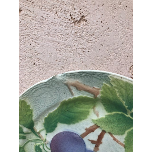 Majolica plums plate signed Keller & Guerin Saint Clement Circa 1900.