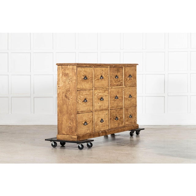 Circa 1890 Large 19thC English Bleached Pine Haberdashery Drawers. W176 x D32 x H101 cm.