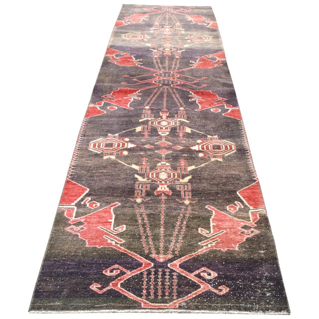 Hand-knotted with care using traditional rug-making techniques, this wool rug blends timeless craftsmanship with a modern...