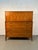 A striking example of American mid-century craftsmanship, this vintage highboy dresser by Red Lion Table Company showcases...