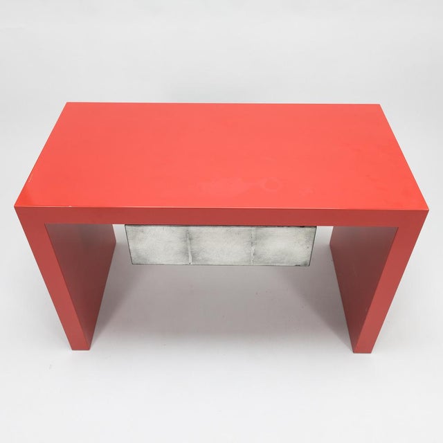 A pair of tables by Kaisa Blomstedt, 2003. Made to order by the designer. With sliding drawer. Red lacquered and nickel-...