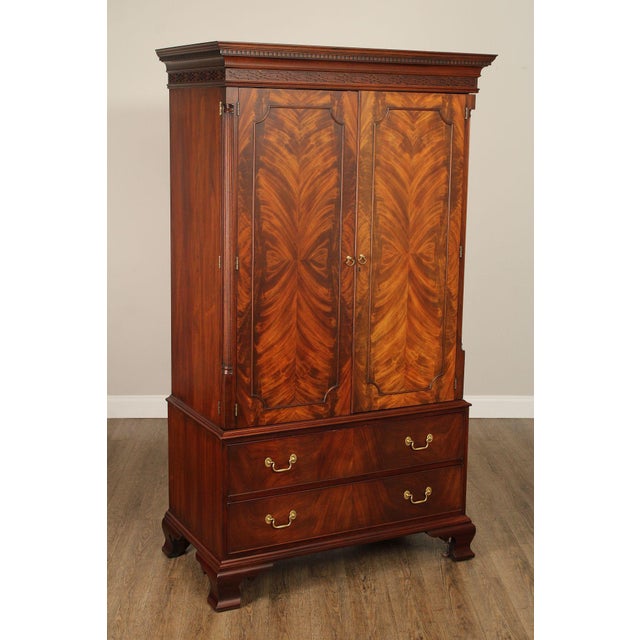 High Quality American Made Flame Mahogany Armoire with Two Doors Opening to Slide-Out TV Platform, Over Compartmented Drawers