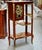 Elegant and refined, this French Louis XVI-style étagère showcases the sophisticated symmetry and decorative craftsmanship...