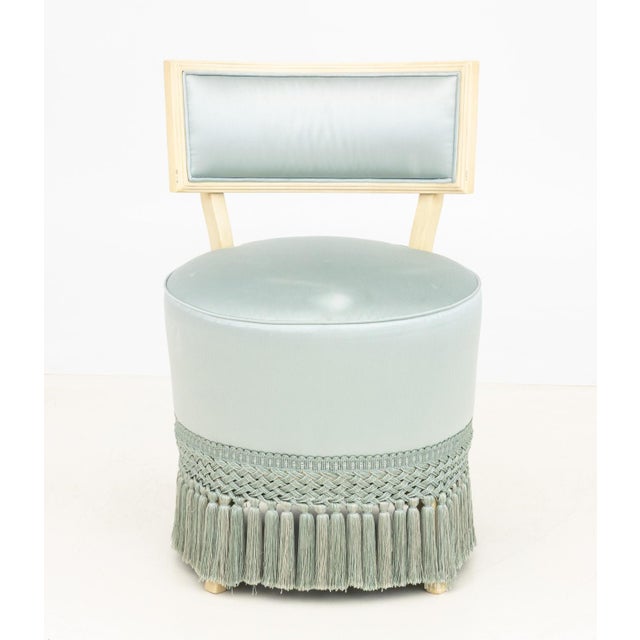 Dorothy Draper Style White Painted Upholstered Vanity Chair, with blue satin upholstered cushion and tassel trim. 30.75" H...