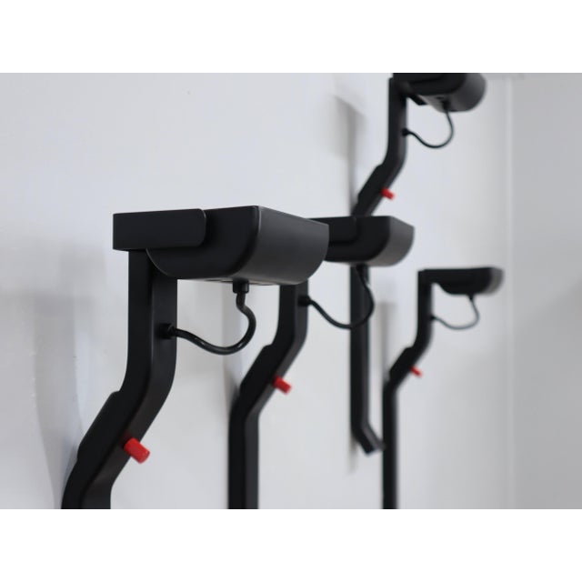 Elevate your space with the sleek, postmodern elegance of the sirio wall lights, designed by kazuhide takahama for sirrah...