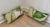 Pair of 12" H x 21" W outdoor pillows in CW Stockwell's 'Martinique' in Color 'Seadrift' - the original banana leaf print...