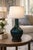 Dark green glazed ceramic table lamp with a glossy finish and organic silhouette. Sold without bulb or shade. European...