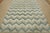 This contemporary geometric Moroccan Chevron rug is hand-knotted with an all-wool high-low pile on a cotton foundation....