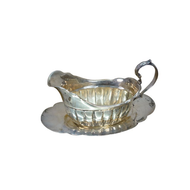 Antique Fisher Silversmiths sterling silver sauce / gravy boat and underplate tray featuring a ribbed or fluted body, a...