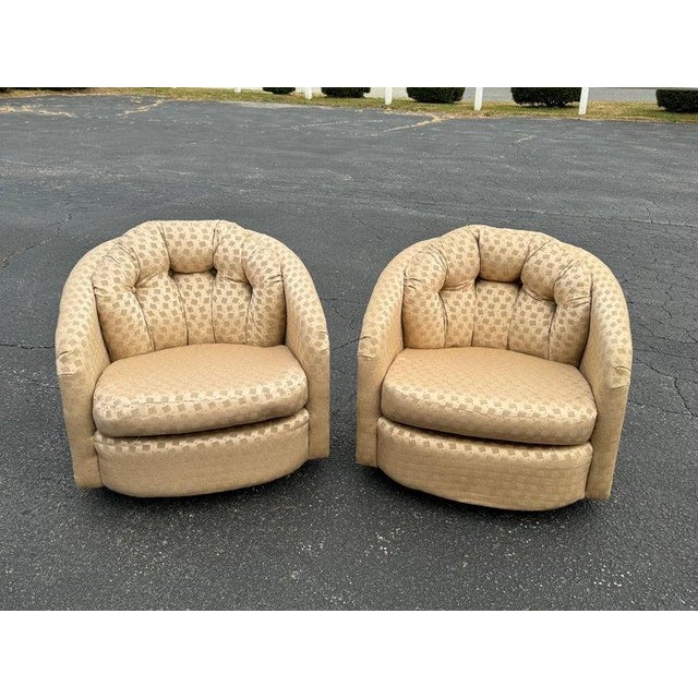 Pair of Champagne Colored Swivel Chairs. Made by the Les Brown Chair Company of Hermansville, Michigan until the 1990s....