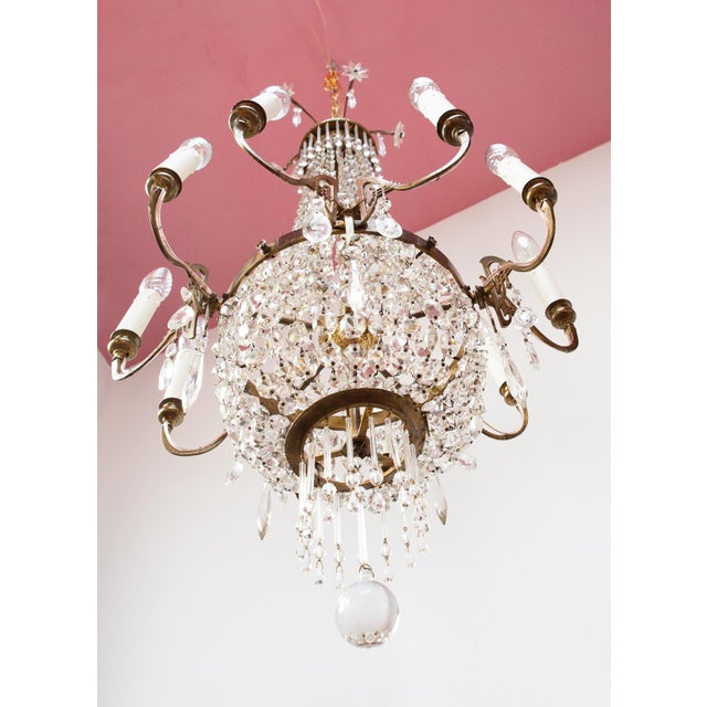 For 10 bulbs type E14. Height with the chain on the photos: 120 cm. Up to 250V (Europe/UK Standard).The wiring of this...